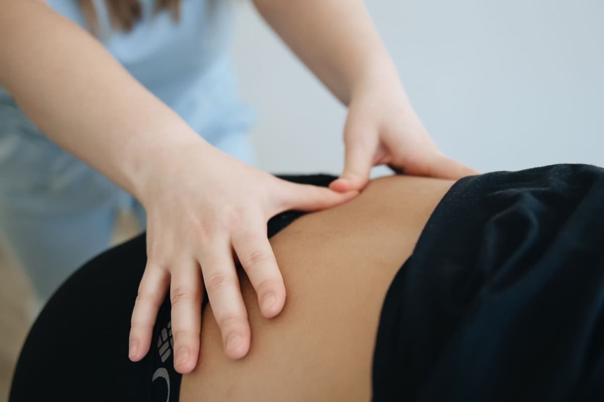 Physiotherapist doing hands-on treatment